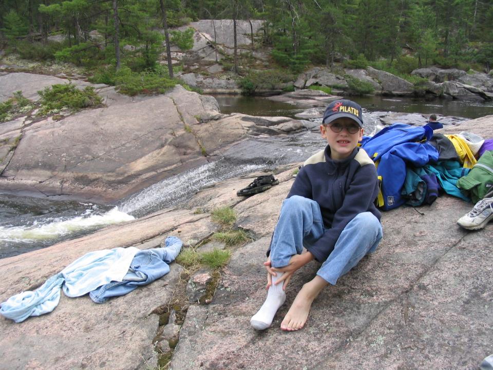 Eric beside the natural water slide